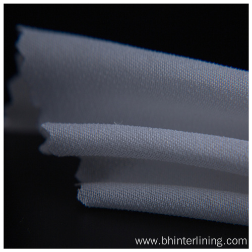 Polyester adhesive double dot woven coat fusing interlining